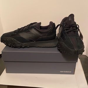 Band new men’s size 4 1/2 new balance sneakers all black never been worn